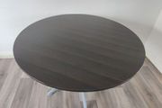 Round Dark Wood Dining Table