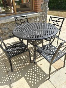 Wrought Iron Patio Table and four chairs