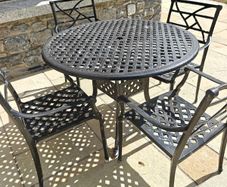 Wrought Iron Patio Table and four chairs