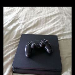 ps4 like new barely used 1000gb storage plus controller