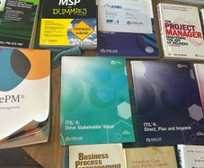 Box of project management books