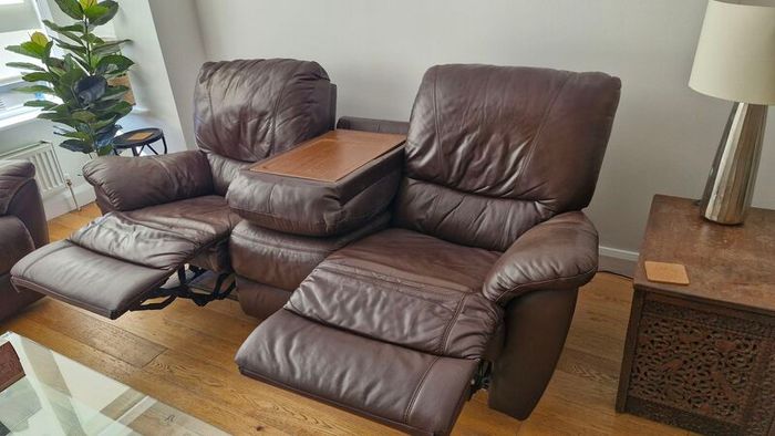Suite of reclining leather sofas
