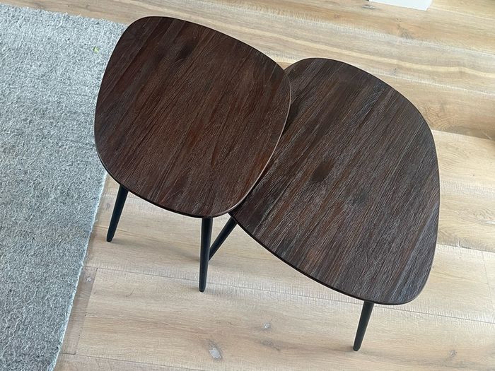 2 coffee tables in dark wood/ black legs. Unused. From Arnotts. Kidney shaped.