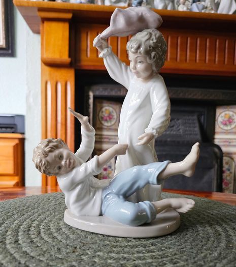 NAO by Lladro "Pillow Fight" Figurine