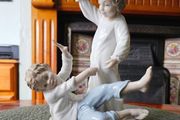 NAO by Lladro "Pillow Fight" Figurine