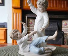 NAO by Lladro "Pillow Fight" Figurine