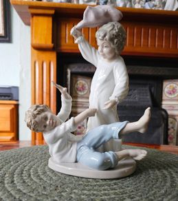 NAO by Lladro "Pillow Fight" Figurine
