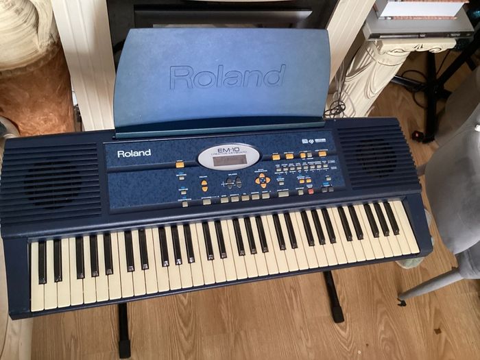 EM-10 Creative Keyboard with music stand and keyboard stand in excellent working condition for quick sale