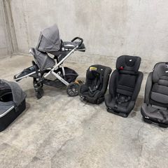 Uppababy Vista twin buggy and three Joie car seats