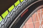 Bike tyre MITAS puncture protection with reflection on the side
