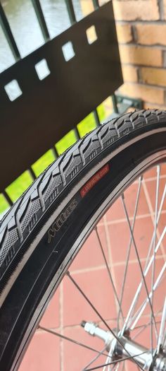 Bike tyre MITAS puncture protection with reflection on the side