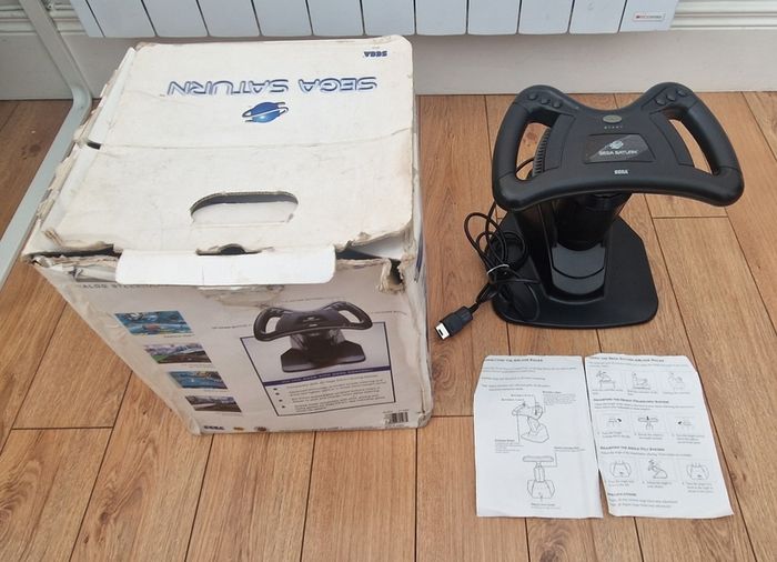 Sega Saturn w/ 3D Control Pad, Arcade Racer, Lightgun and Games