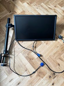 Dell monitor with adjustable stand that clamps to desk