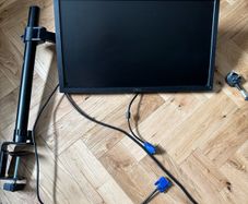 Dell monitor with adjustable stand that clamps to desk