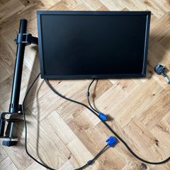 Dell monitor with adjustable stand that clamps to desk