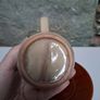 Dark and light brown cup and saucer Image 3