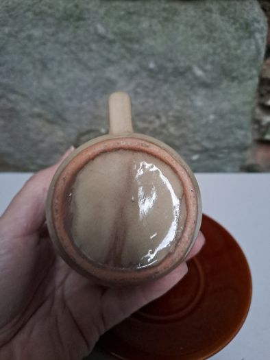 Dark and light brown cup and saucer