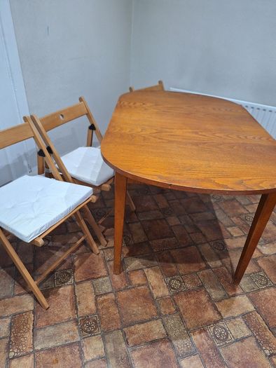 Table and 4 fold up chairs