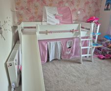 Mid sleeper bed with slide