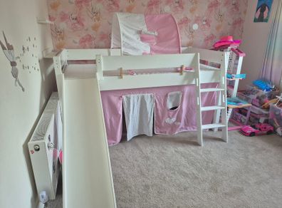 Mid sleeper bed with slide