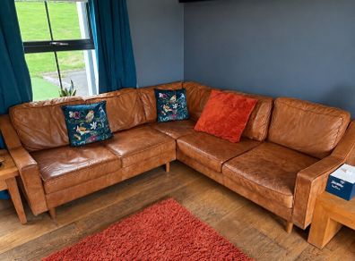 Tan leather corner sofa. Open to offers