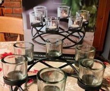 Vortex celtic cast iron tealight holder, good heavy iron and very thick glass. Great quality. New in box.