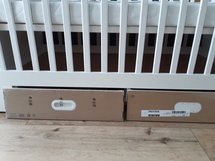 Ikea Stuva crib that can turn into a toddler bed and Ikea Skonast mattress