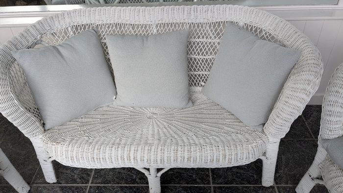 White wicker conservatory set - sofa, two chairs and table