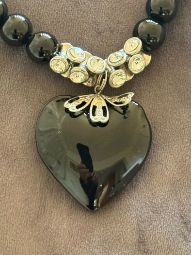 Black necklace with large black heart pendant