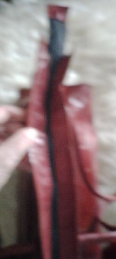 Leather bags one large red long handles tote or shoulde and one smaller shoulder Bag. Shoulder is 15r leather