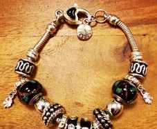 Pandora bracelet with charms.