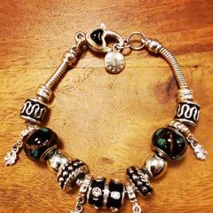 Pandora bracelet with charms.