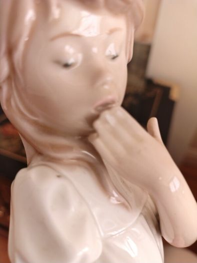 Nao by Lladro.  Yawning Girl. Damaged.