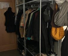 Open Wardrobe with clothes rail.