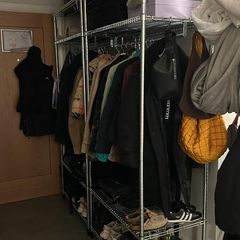 Open Wardrobe with clothes rail.