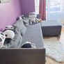 Grey fabric sofa with matching footstool Image 2
