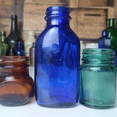 461 - Set of Three Beautiful Vintage Glass Decorative Collectible Bottles - Amber Eire Bovril, Cobalt Blue Magnesia and Turquoise Science Cream