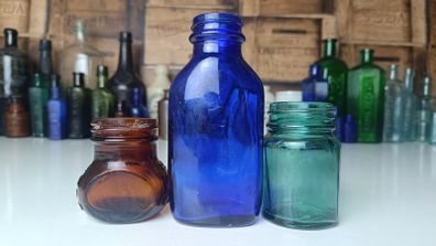 461 - Set of Three Beautiful Vintage Glass Decorative Collectible Bottles - Amber Eire Bovril, Cobalt Blue Magnesia and Turquoise Science Cream