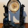 Black clock with family figurines Image 2