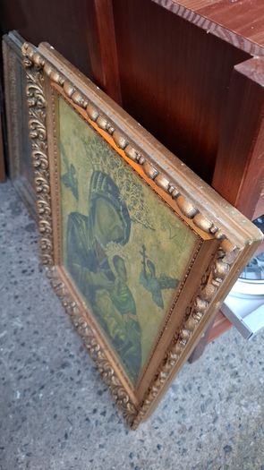 Antique holy statue and pictures