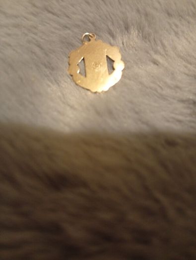Gold pendant Manchester United