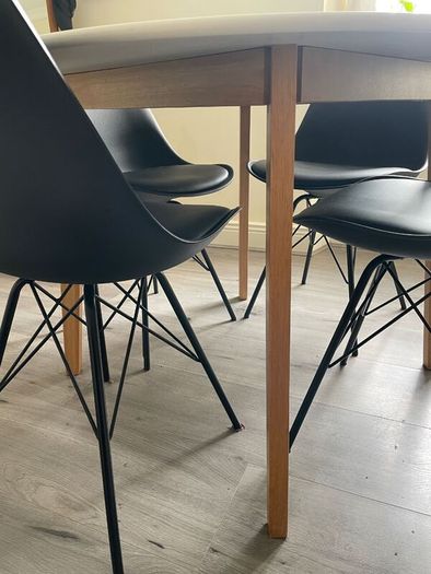 Round White Dining Table + Modern Chairs