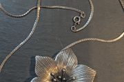 Silver flower pendant