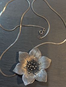 Silver flower pendant