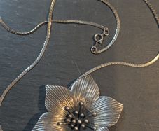 Silver flower pendant