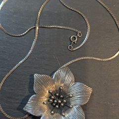 Silver flower pendant