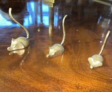 Three brass vintage mice