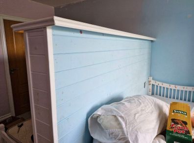 single beds & wall divider