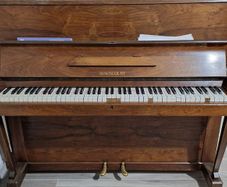 Kingscourt piano, manufactured by Pigott and Company, Dublin. Made in England