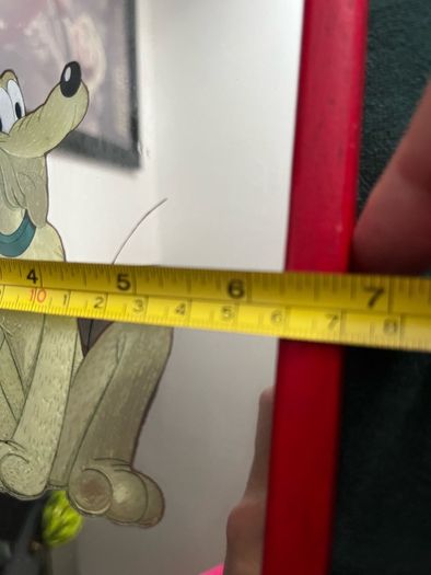 Small vintage Pluto mirror